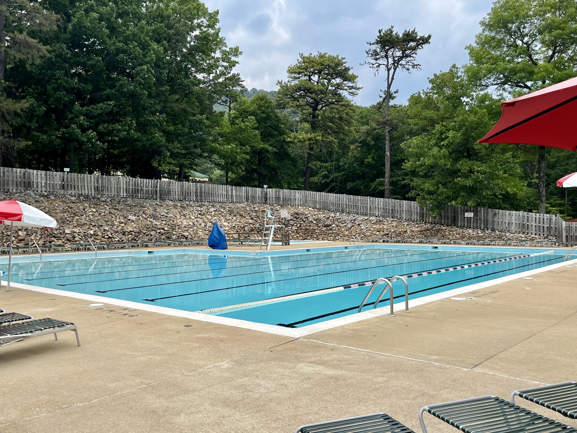Shared outdoor resort pool with swimming lanes